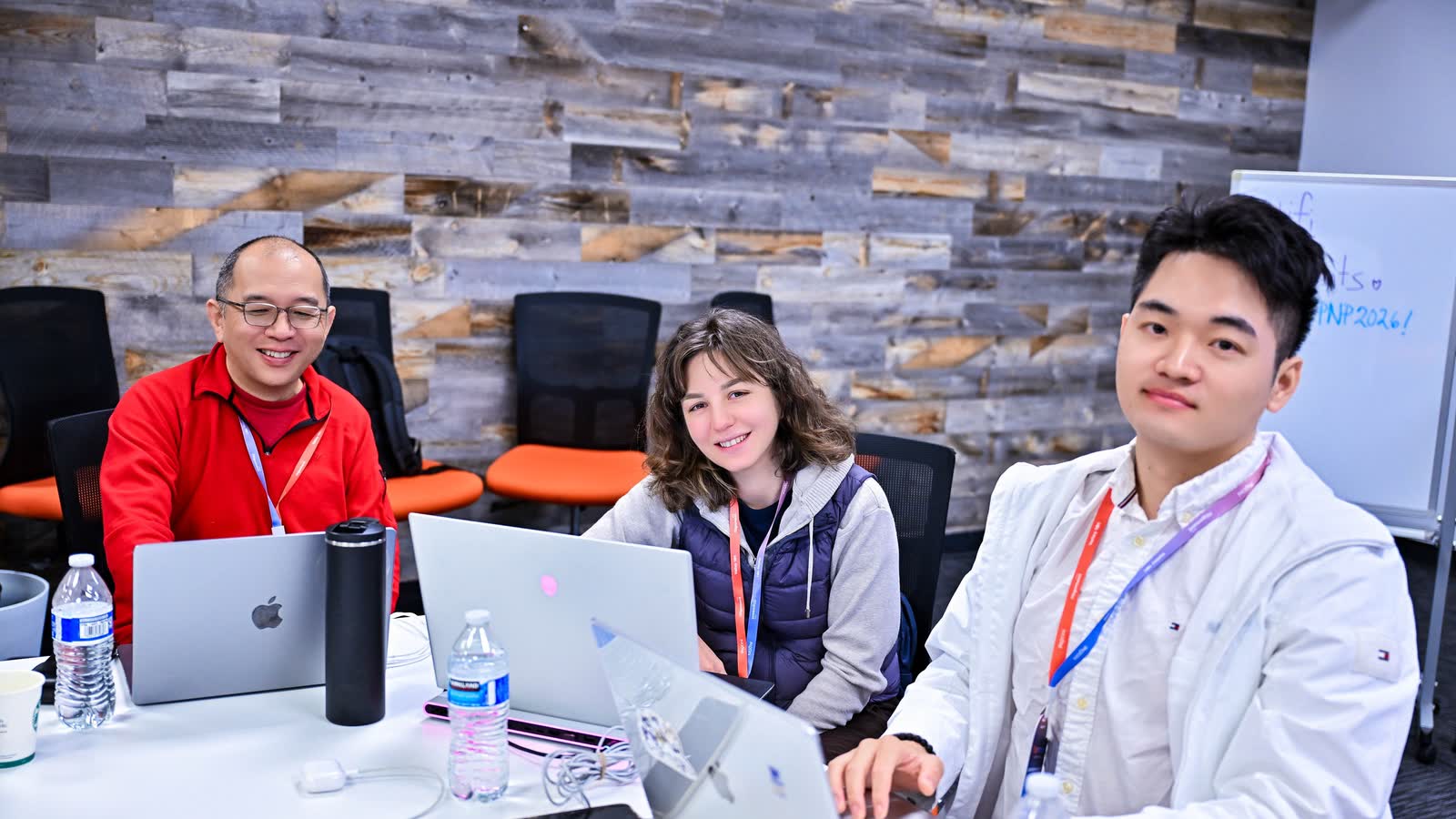 A team at its table on the lab floor